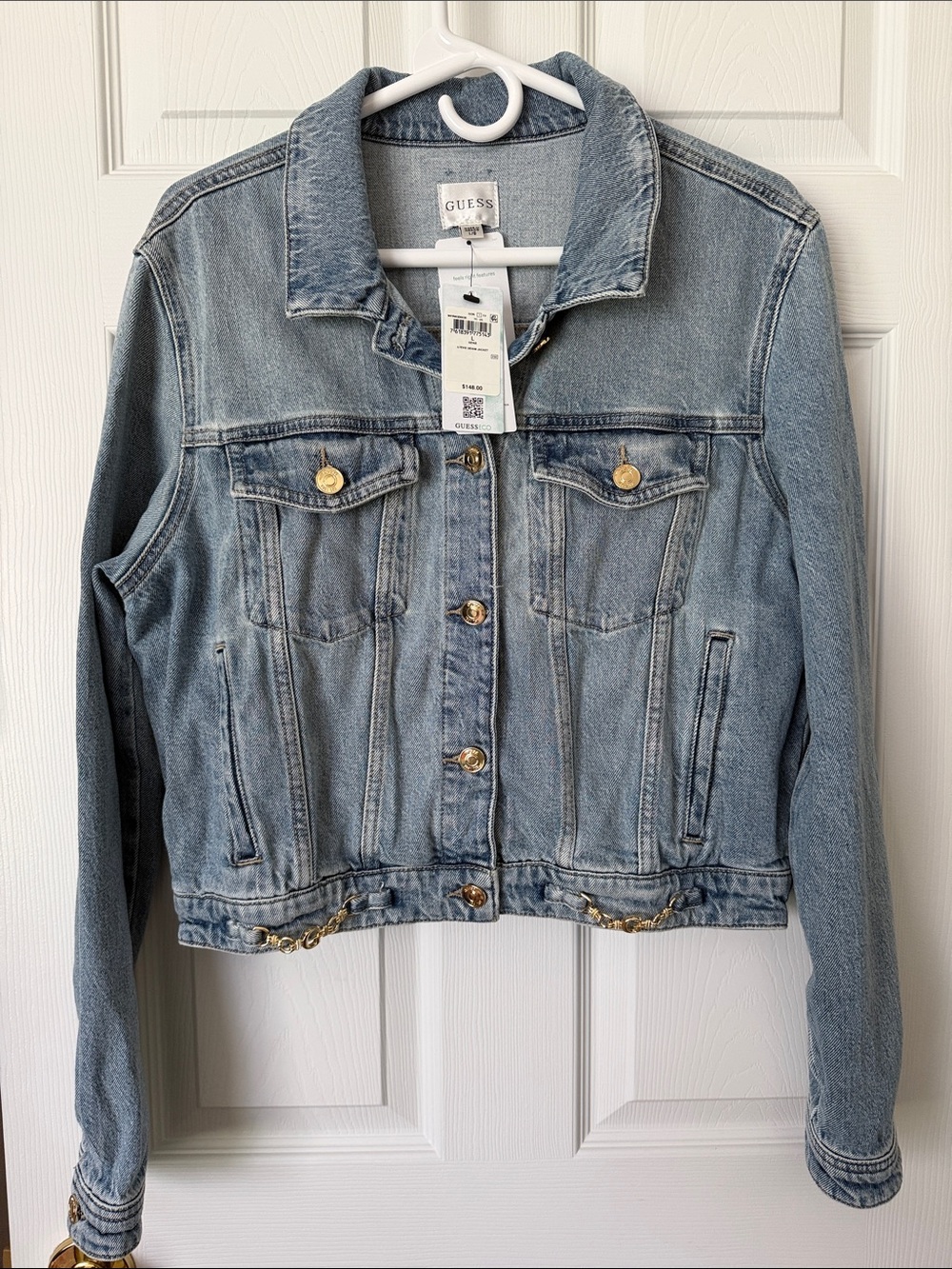 GUESS Light Wash Blue Denim Trucker Jacket with silver Buttons and detail